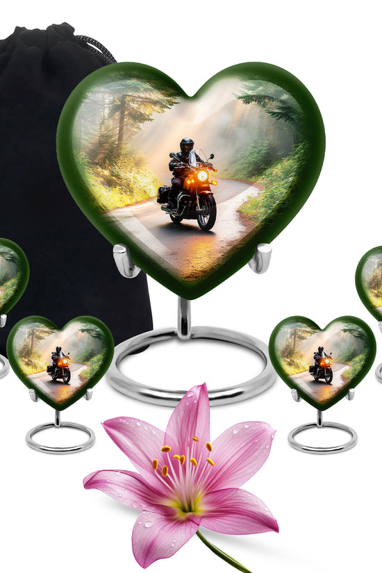 Sunrise Gold Bike Cremation Urn close-up of engraving and surface detail - loving heart memorial featuring bike pattern - memorial set with one large and four small urns