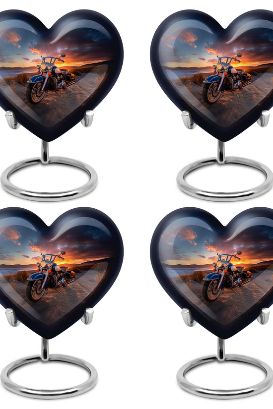 Dark Black Bike Cremation Urn angled view of lid and engraved motif - compassionate heart-bike combination with gentle curves - 10 inch aluminum urn for cremated remains