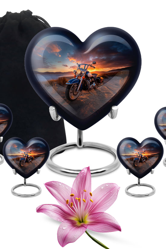 Deep Black Bike Cremation Urn close-up of engraving and surface detail - loving heart memorial featuring bike pattern - memorial set with one large and four small urns
