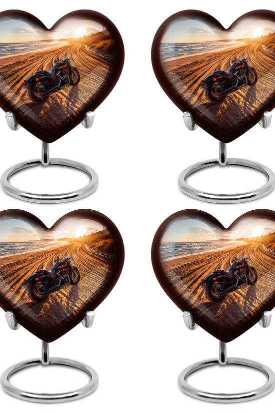 Pewter Gray Bike Cremation Urn angled view of lid and engraved motif - loving heart memorial featuring bike pattern - 10 inch aluminum urn for cremated remains