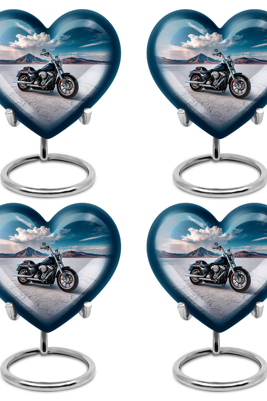 Sapphire Blue Bike Cremation Urn angled view of lid and engraved motif - compassionate heart-bike combination with gentle curves - 10 inch aluminum urn for cremated remains