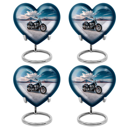 Sapphire Blue Bike Cremation Urn angled view of lid and engraved motif - compassionate heart-bike combination with gentle curves - 10 inch aluminum urn for cremated remains