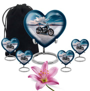 Dusty Blue Bike Cremation Urn close-up of engraving and surface detail - loving heart memorial featuring bike pattern - memorial set with one large and four small urns