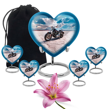 Sapphire Blue Bike Cremation Urn close-up of engraving and surface detail - compassionate heart-bike combination with gentle curves - memorial set with one large and four small urns