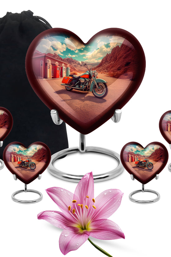 Aqua Teal Bike Cremation Urn close-up of engraving and surface detail - romantic heart urn with bike motif on aluminum - memorial set with one large and four small urns