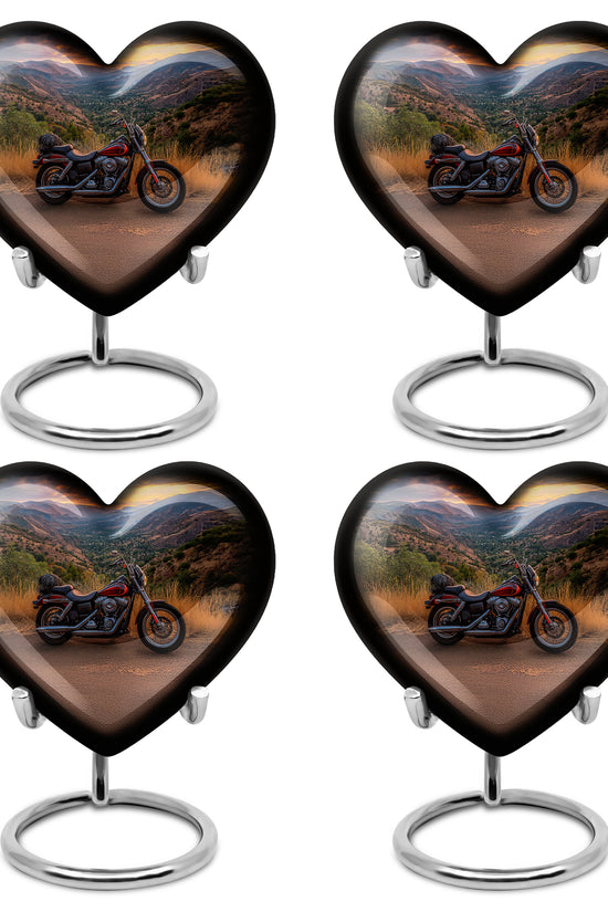 Soft Blue Bike Cremation Urn angled view of lid and engraved motif - compassionate heart-bike combination with gentle curves - 10 inch aluminum urn for cremated remains
