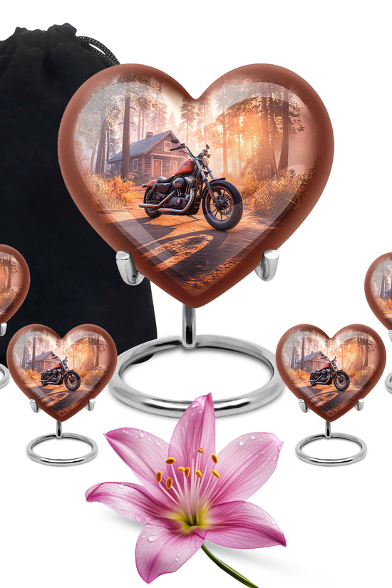 Deep Red Bike Cremation Urn close-up of engraving and surface detail - loving heart memorial featuring bike pattern - memorial set with one large and four small urns