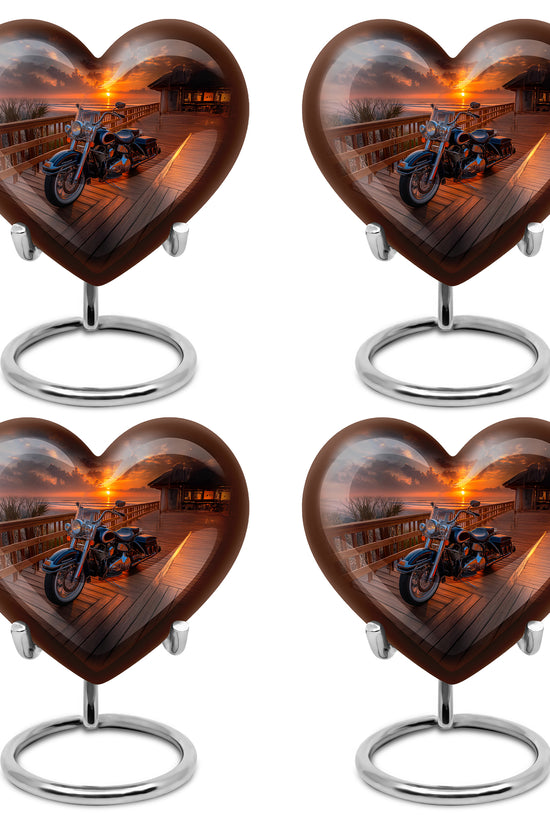Jet Black Bike Cremation Urn angled view of lid and engraved motif - loving heart memorial featuring bike pattern - 10 inch aluminum urn for cremated remains