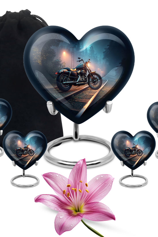Twilight Blue Bike Cremation Urn close-up of engraving and surface detail - compassionate heart-bike combination with gentle curves - memorial set with one large and four small urns