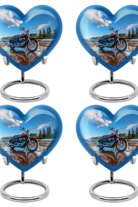 Dusty Blue Bike Cremation Urn angled view of lid and engraved motif - loving heart memorial featuring bike pattern - 10 inch aluminum urn for cremated remains