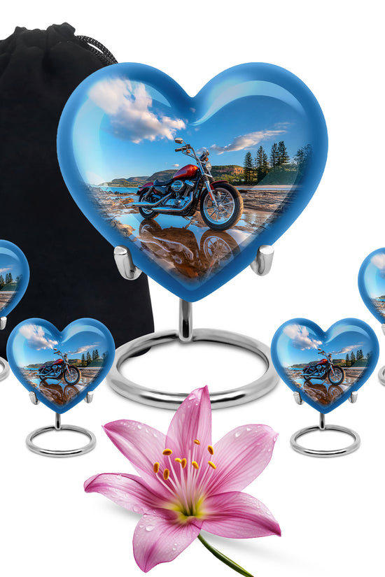 Twilight Blue Bike Cremation Urn close-up of engraving and surface detail - romantic heart urn with bike motif on aluminum - memorial set with one large and four small urns