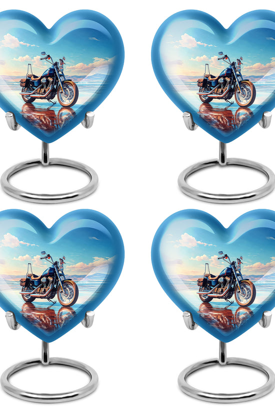 Powder Blue Bike Cremation Urn angled view of lid and engraved motif - heart-shaped bike design symbolizing eternal love - 10 inch aluminum urn for cremated remains