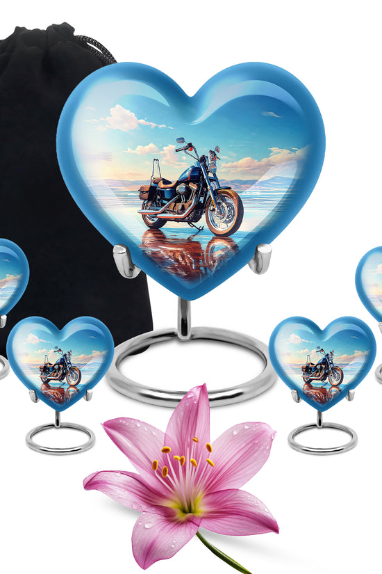 Soft Blue Bike Cremation Urn close-up of engraving and surface detail - romantic heart urn with bike motif on aluminum - memorial set with one large and four small urns