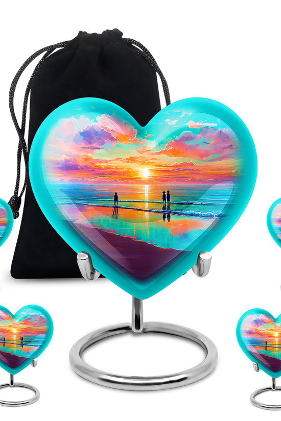 Ocean Teal Beach Cremation Urn close-up of engraving and surface detail - heart-shaped beach design symbolizing eternal love - memorial set with one large and four small urns
