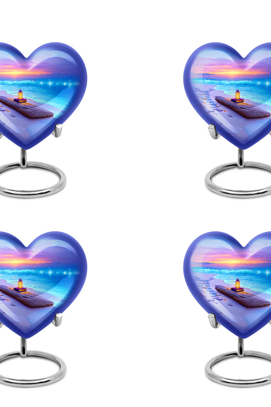 Soft Blue Beach Cremation Urn angled view of lid and engraved motif - compassionate heart-beach combination with gentle curves - 10 inch aluminum urn for cremated remains