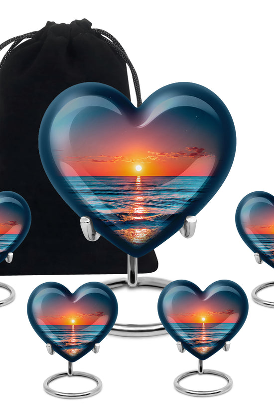 Sapphire Blue Beach Cremation Urn close-up of engraving and surface detail - romantic heart urn with beach motif on aluminum - memorial set with one large and four small urns