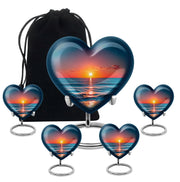 Sapphire Blue Beach Cremation Urn close-up of engraving and surface detail - romantic heart urn with beach motif on aluminum - memorial set with one large and four small urns