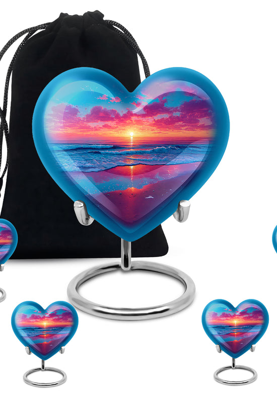 Azure Beach Cremation Urn close-up of engraving and surface detail - heart-shaped beach design symbolizing eternal love - memorial set with one large and four small urns