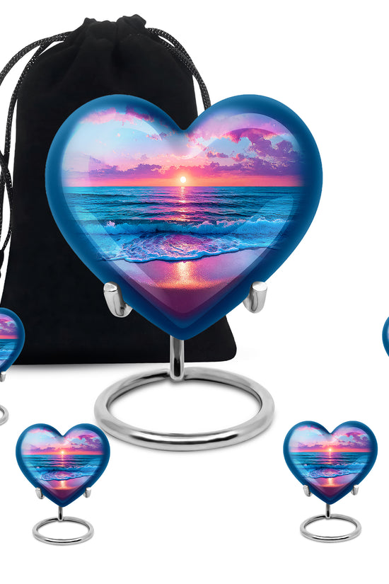 Sapphire Blue Beach Cremation Urn close-up of engraving and surface detail - romantic heart urn with beach motif on aluminum - memorial set with one large and four small urns