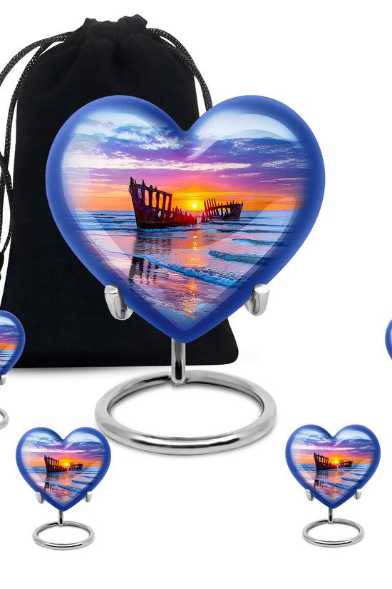 Cornflower Blue Beach Cremation Urn close-up of engraving and surface detail - romantic heart urn with beach motif on aluminum - memorial set with one large and four small urns