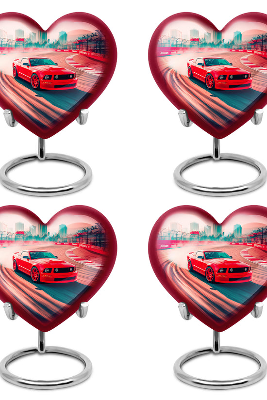 Ruby Red Car Cremation Urn angled view of lid and engraved motif - compassionate heart-car combination with gentle curves - 10 inch aluminum urn for cremated remains