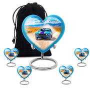 Navy Blue Car Cremation Urn close-up of engraving and surface detail - loving heart memorial featuring car pattern - memorial set with one large and four small urns