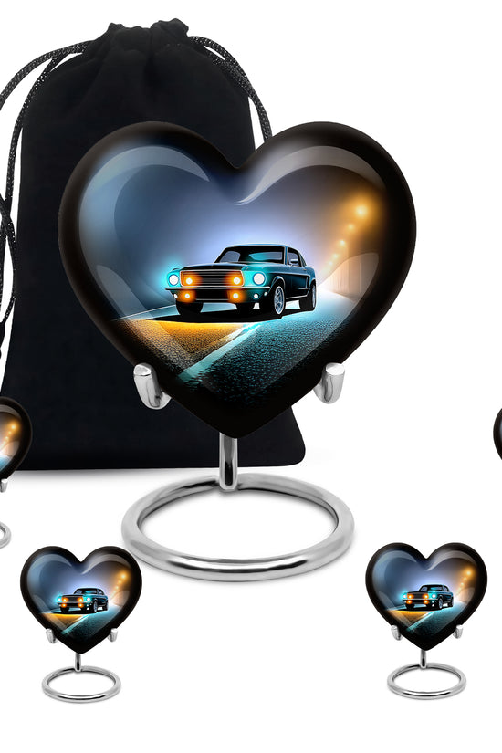 Jet Black Car Cremation Urn close-up of engraving and surface detail - loving heart memorial featuring car pattern - memorial set with one large and four small urns