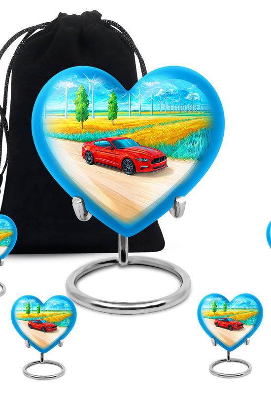 Royal Blue Car Cremation Urn close-up of engraving and surface detail - romantic heart urn with car motif on aluminum - memorial set with one large and four small urns