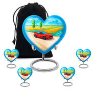 Royal Blue Car Cremation Urn close-up of engraving and surface detail - romantic heart urn with car motif on aluminum - memorial set with one large and four small urns