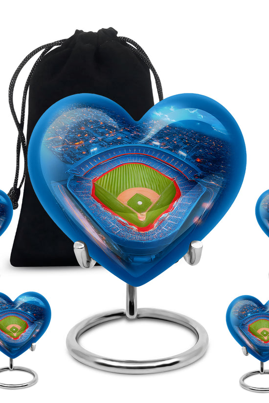 Soft Blue Baseball Cremation Urn close-up of engraving and surface detail - romantic heart urn with baseball motif on aluminum - memorial set with one large and four small urns