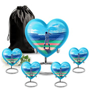 Indigo Baseball Cremation Urn close-up of engraving and surface detail - loving heart memorial featuring baseball pattern - memorial set with one large and four small urns