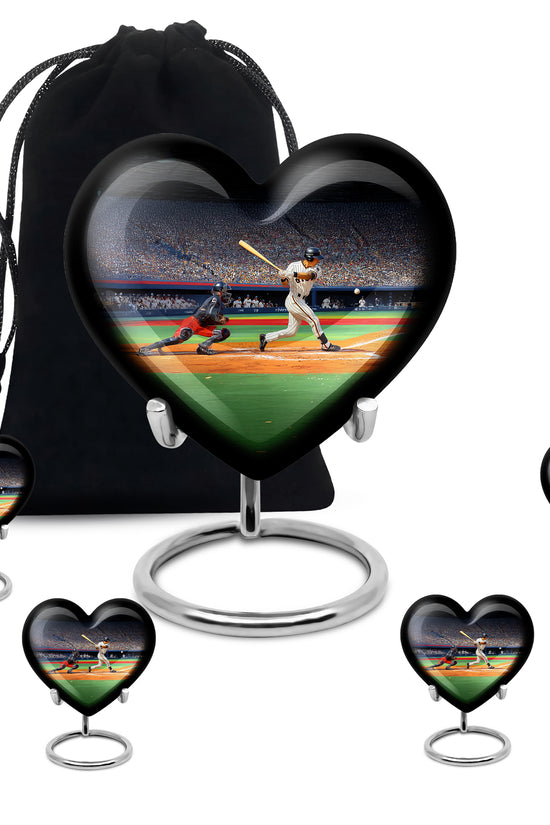 Deep Black Baseball Cremation Urn close-up of engraving and surface detail - heart-shaped baseball design symbolizing eternal love - memorial set with one large and four small urns