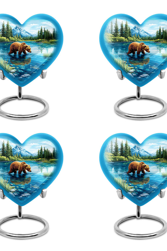 Royal Blue Bear Cremation Urn angled view of lid and engraved motif - compassionate heart-bear combination with gentle curves - 10 inch aluminum urn for cremated remains