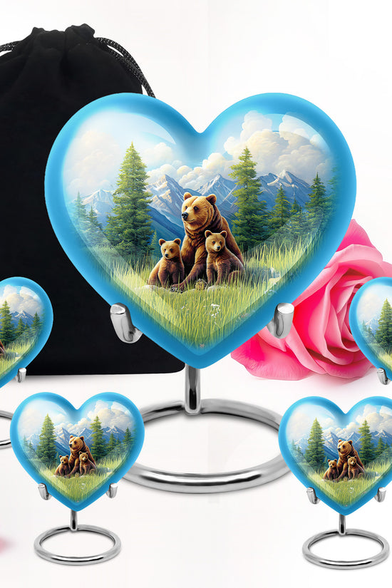 Sapphire Blue Bear Cremation Urn close-up of engraving and surface detail - romantic heart urn with bear motif on aluminum - memorial set with one large and four small urns