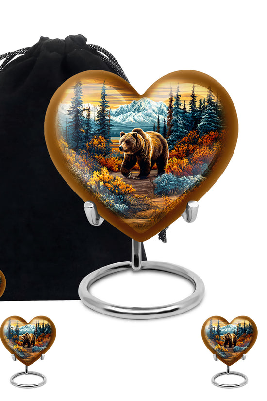 Gilded Gold Bear Cremation Urn close-up of engraving and surface detail - heart-shaped bear design symbolizing eternal love - memorial set with one large and four small urns