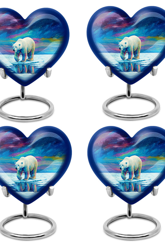 Sapphire Blue Bear Cremation Urn angled view of lid and engraved motif - compassionate heart-bear combination with gentle curves - 10 inch aluminum urn for cremated remains