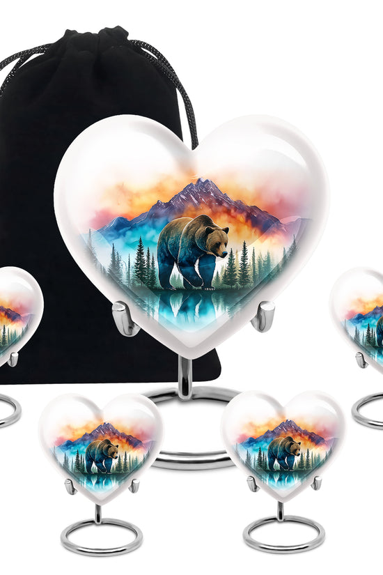 Gleaming Silver Bear Cremation Urn close-up of engraving and surface detail - heart-shaped bear design symbolizing eternal love - memorial set with one large and four small urns