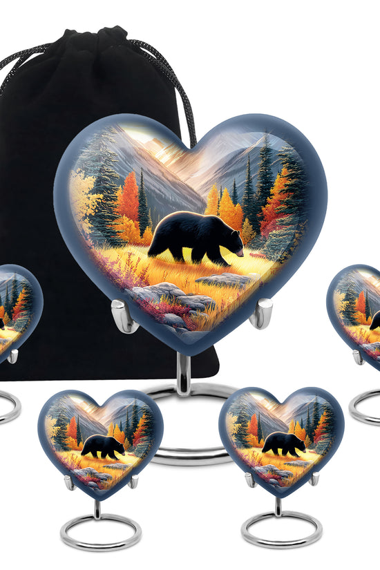 Sunrise Gold Bear Cremation Urn close-up of engraving and surface detail - heart-shaped bear design symbolizing eternal love - memorial set with one large and four small urns