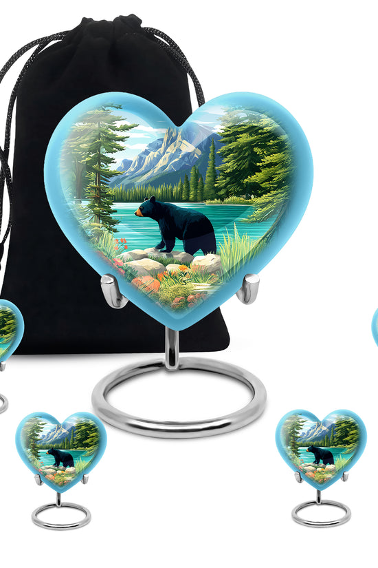 Icy Blue Bear Cremation Urn close-up of engraving and surface detail - heart-shaped bear design symbolizing eternal love - memorial set with one large and four small urns