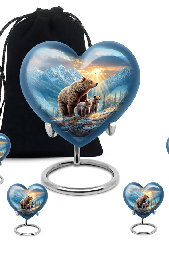 Vivid Blue Bear Cremation Urn close-up of engraving and surface detail - romantic heart urn with bear motif on aluminum - memorial set with one large and four small urns