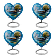 Misty Blue Boat Cremation Urn angled view of lid and engraved motif - heart-shaped boat design symbolizing eternal love - 10 inch aluminum urn for cremated remains