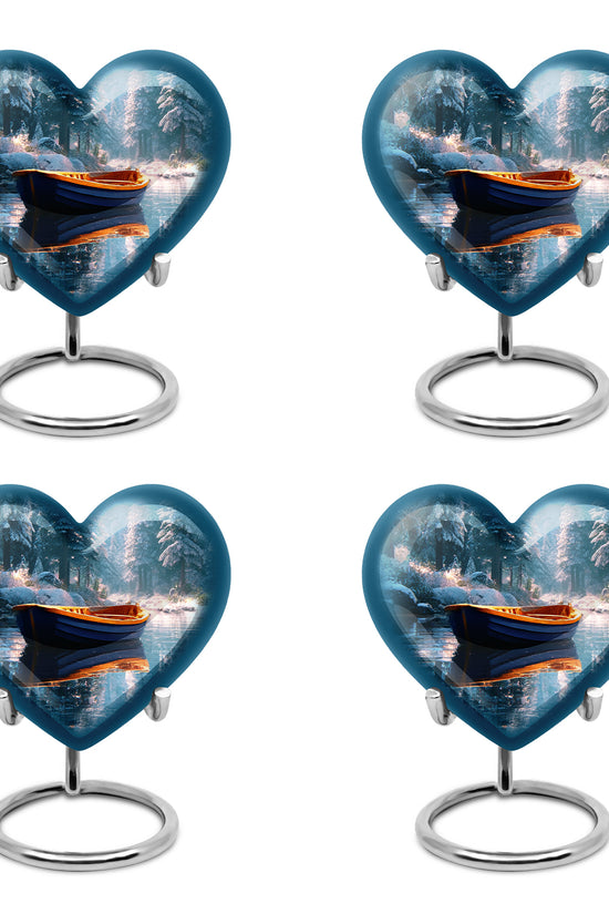Jewel Teal Boat Cremation Urn angled view of lid and engraved motif - heart-shaped boat design symbolizing eternal love - 10 inch aluminum urn for cremated remains