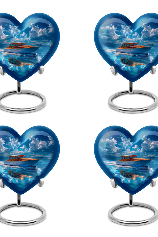 Soft Blue Boat Cremation Urn angled view of lid and engraved motif - romantic heart urn with boat motif on aluminum - 10 inch aluminum urn for cremated remains