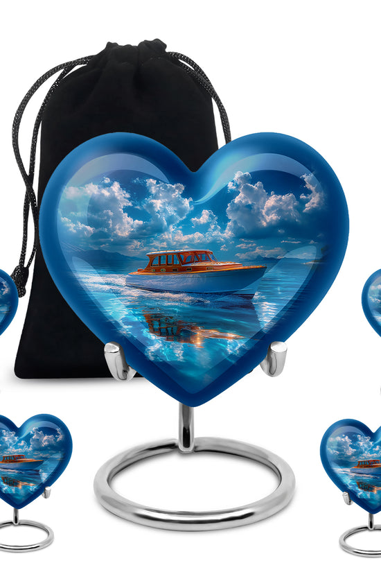 Celestial Blue Boat Cremation Urn close-up of engraving and surface detail - heart-shaped boat design symbolizing eternal love - memorial set with one large and four small urns