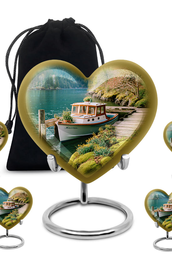 Cool Teal Boat Cremation Urn close-up of engraving and surface detail - heart-shaped boat design symbolizing eternal love - memorial set with one large and four small urns