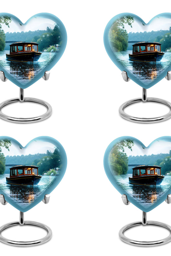 Cloud White Boat Cremation Urn angled view of lid and engraved motif - compassionate heart-boat combination with gentle curves - 10 inch aluminum urn for cremated remains