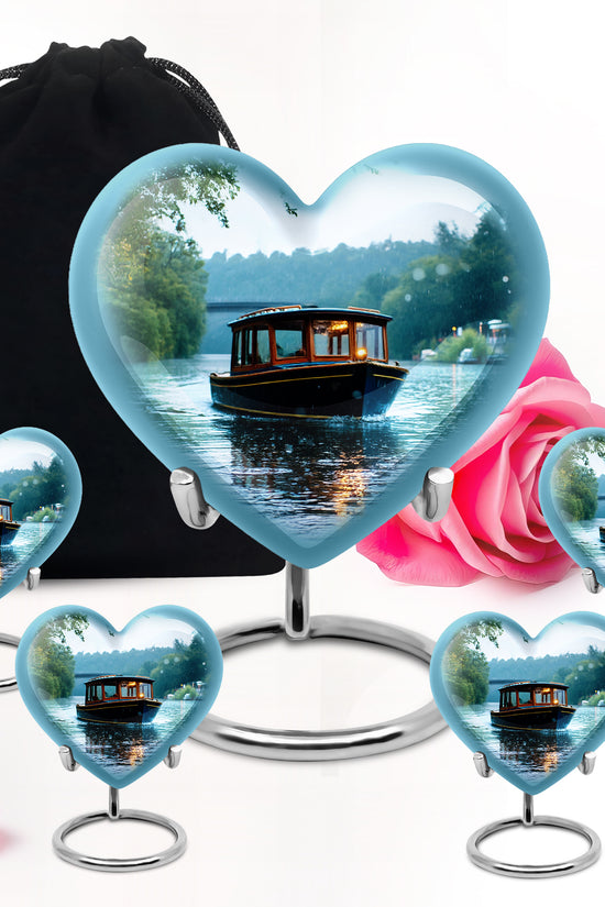 Porcelain White Boat Cremation Urn close-up of engraving and surface detail - compassionate heart-boat combination with gentle curves - memorial set with one large and four small urns