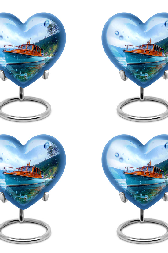 Icy Blue Boat Cremation Urn angled view of lid and engraved motif - heart-shaped boat design symbolizing eternal love - 10 inch aluminum urn for cremated remains
