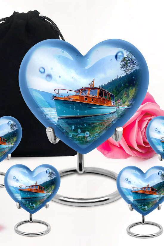 Dusty Blue Boat Cremation Urn close-up of engraving and surface detail - loving heart memorial featuring boat pattern - memorial set with one large and four small urns