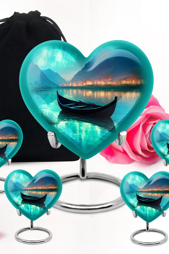 Vivid Teal Boat Cremation Urn close-up of engraving and surface detail - compassionate heart-boat combination with gentle curves - memorial set with one large and four small urns